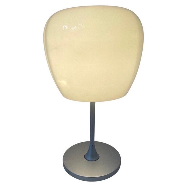 Vintage lamp produced under the model name ‘Althorn’ for Ikea. A gray metal base houses a glass, mushroom like dome that...