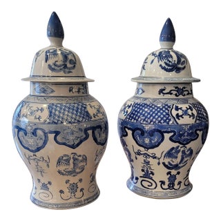 Late 20th Century Chinese Blue and White Phoenix Dragon Lidded Temple Ginger Jars- Set of 2 For Sale