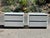 Rare 1980s white lacquered nightstands with contrasting ribbed black rubber accents by Roger Rougier. Beautiful ultra...