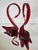 A classic example of mid-century Murano decorative glass. A sculptural pair of Murano ruby red art glass swans, hand-...
