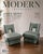 A pair of James Mont style lounge chairs upholstered in sage green mohair velvet, featuring distinct architectural cutout...