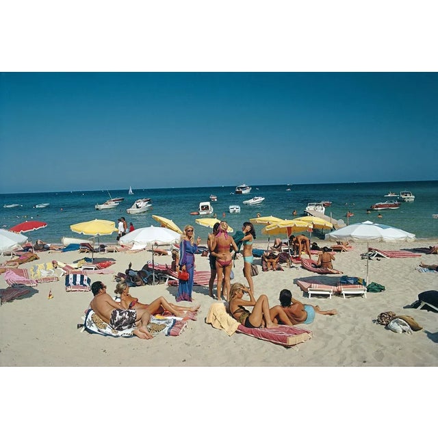Saint-Tropez Beach 1977 Sunbathers on the beach at St. Tropez, France, 1977. (photo Slim Aarons) Slim Aarons was one of...