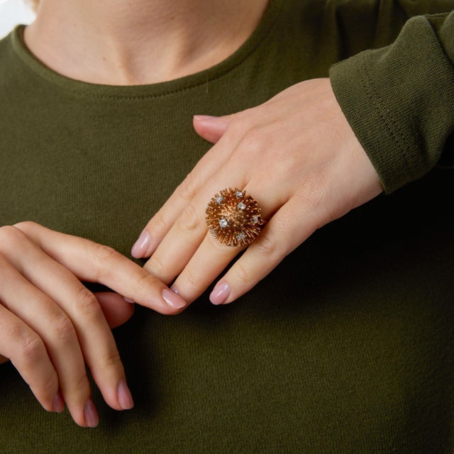 A bold and sculptural vintage ring by the celebrated jewelry house Ruser, this distinctive piece is designed in the...