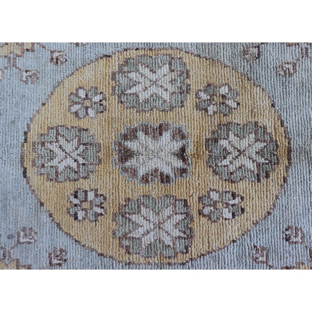 Khotan Rug With Central Medallion in Soft Blue, Golden Beige, and Warm Taupe For Sale - Image 10 of 13