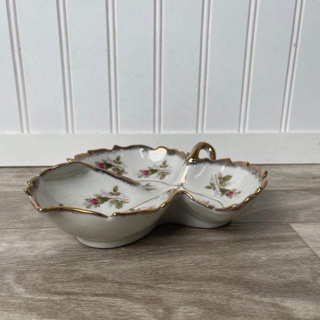 Elevate your vanity or tabletop with this exquisite mid-century porcelain divided dish by Napco. Crafted in Japan circa...