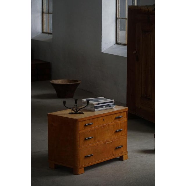 A refined Scandinavian chest of drawers dating from the 1930s–1940s, designed in the transitional period between...
