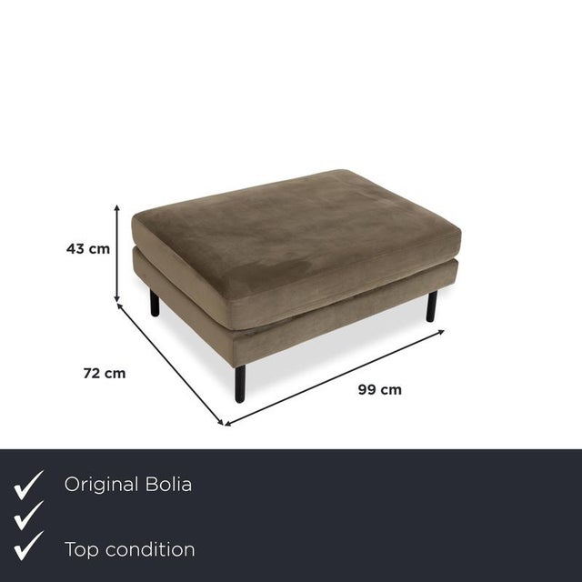 This Bolia Scandinavia stool in olive green is a real find for anyone looking to enhance their living room with a...