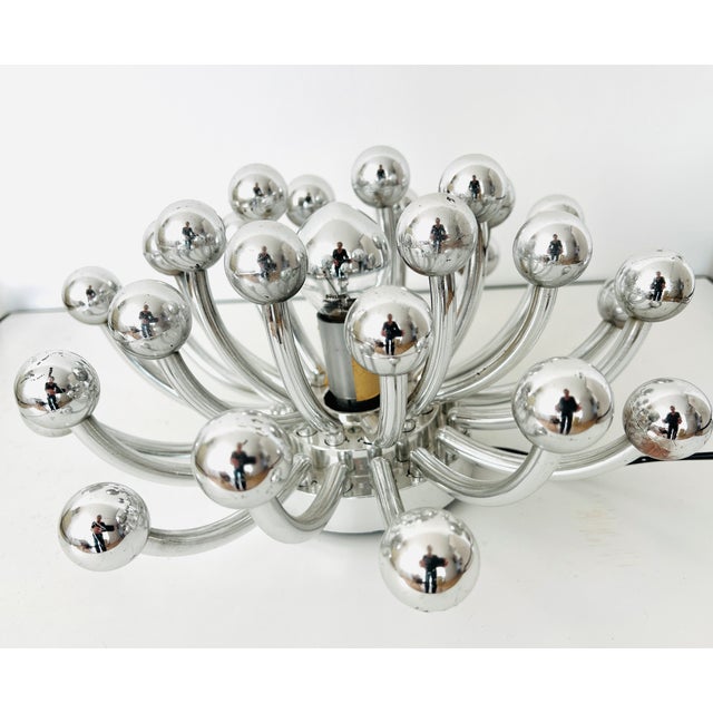 On some of the balls, the chrome plating is slightly worn away. This piece has an attribution mark, I am sure that it is...