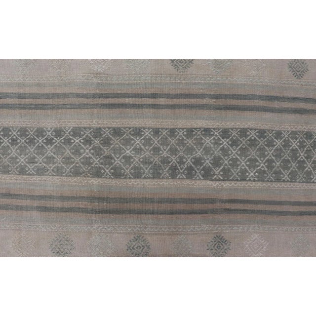 Muted Vintage Turkish Kilim Rug With Horizontal Stripes & Tribal Motifs For Sale - Image 4 of 11