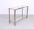 Vintage console table designed by pierre vandel, produced in france in the 1970s. The console is made of silver-plated and...