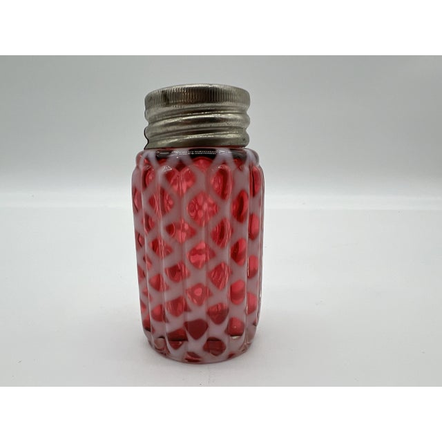 A Antique Cranberry Red Lattice Blown Glass Salt or Pepper Shaker by Northwood, Circa 1890 Most likely made by the...