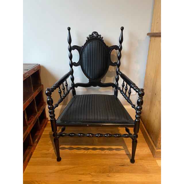 Vintage Painted Black Wood Armchair upholstered in black striped fabric