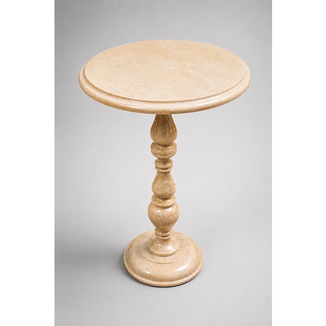 Handcrafted from premium natural marble, this round side table adds timeless elegance to any space. Its unique veining...