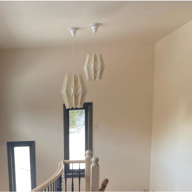 Used Le Klint ceiling fixture in very good condition made in Denmark. Has minor cosmetic wear/tear not at all visible once...