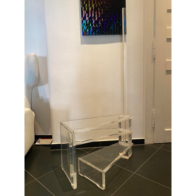 Mid-century library/book staircase, manufactured by Pilati Munich, circa 1970, acrylic glass, three steps and a acrylic...