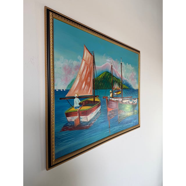 A vibrant original oil painting by Haitian artist Telfort Emmanuel, depicting a colorful scene with traditional sailboats...