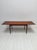 Elegant mid-century Teak dining table in Scandinavian design, dating from the 1960s. The table features a clean...