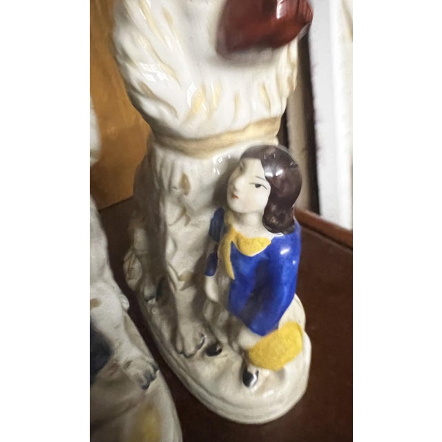 Antique Victorian Staffordshire Figurines - A Charming Pair of Children with Dogs Add a touch of timeless English charm to...