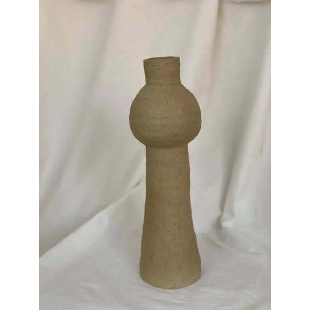 Arleen Vase by Cuit Studio One of a Kind. Dimensions: Ø 10 x H 35,5 cm. Materials: Speckled stoneware natural finish,...