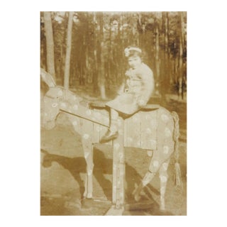 Early 20th Century Girl on Wooden Donkey Sepia Snapshot Photograph For Sale
