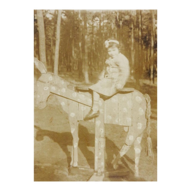 Early 20th Century Girl on Wooden Donkey Sepia Snapshot Photograph For Sale