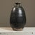 Khmer Stoneware Storage Jar 17th–18th century, Cambodia A robust dark-glazed stoneware jar characteristic of post-...