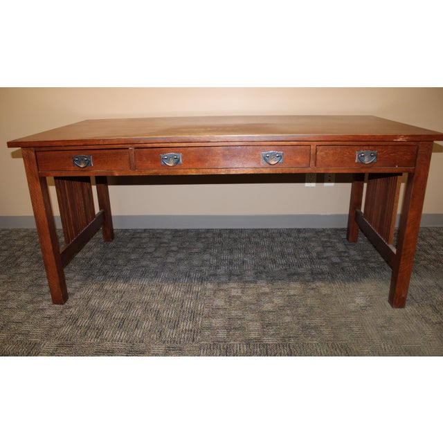 Computer work table with three drawers - Keyboard access in middle drawer and storage in left and right drawers. Wire...