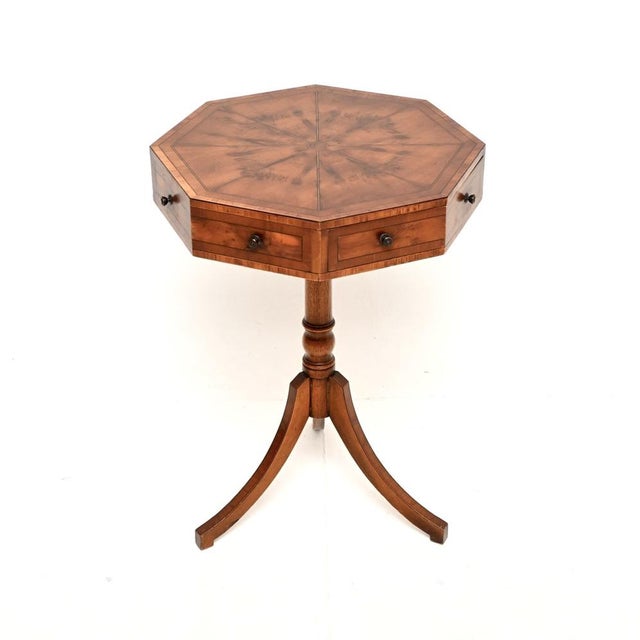 A beautiful and very well made antique Regency style inlaid yew wood octagonal drum table. This was made in England, we...