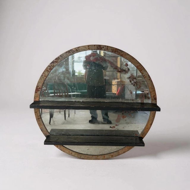 Striking large-scale industrial mirror featuring a circular metal frame with beautifully aged patina and two fixed wooden...