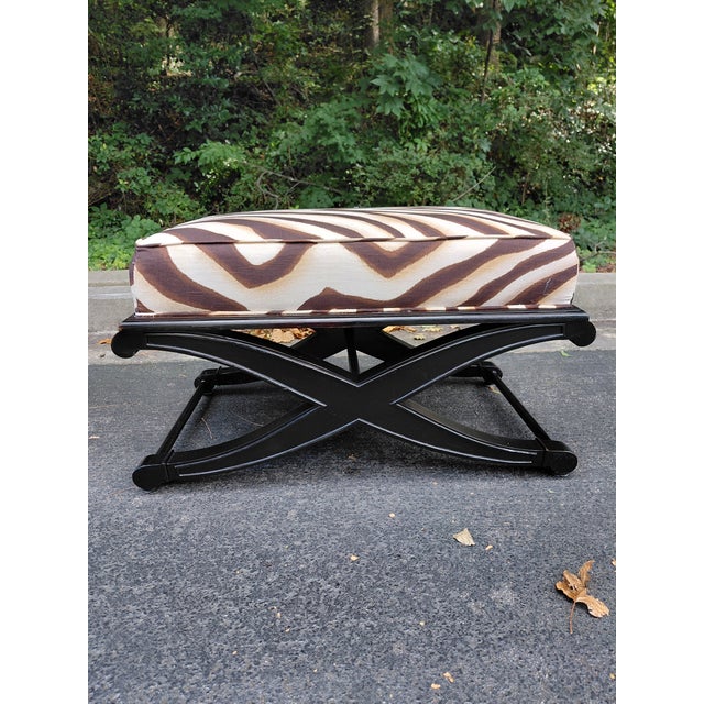A striking pair of vintage X-base benches professionally refinished in a rich black finish and newly upholstered in iconic...