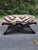 A striking pair of vintage X-base benches professionally refinished in a rich black finish and newly upholstered in iconic...