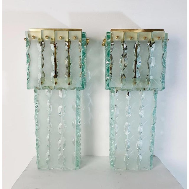 A pair of large and heavy set wall sconces handmade in murano glass as well as structures custom made for this particular...