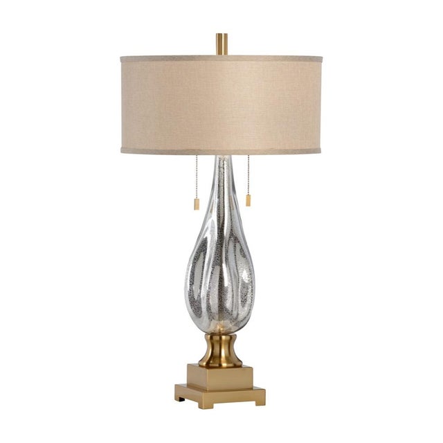 Enhance your traditional decor with this elegant 31.5" Table lamp. The speckled mercury glass body boasts a unique modern...