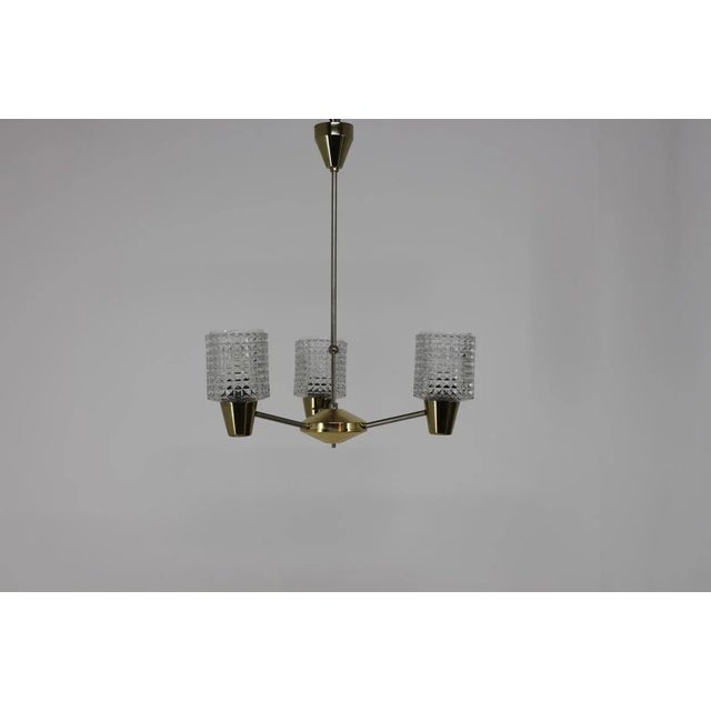 Chandelier from Kamenicky Senov, 1970s, in Very Good conditions. Designed 1970 to 1979 This piece is attributed to the...