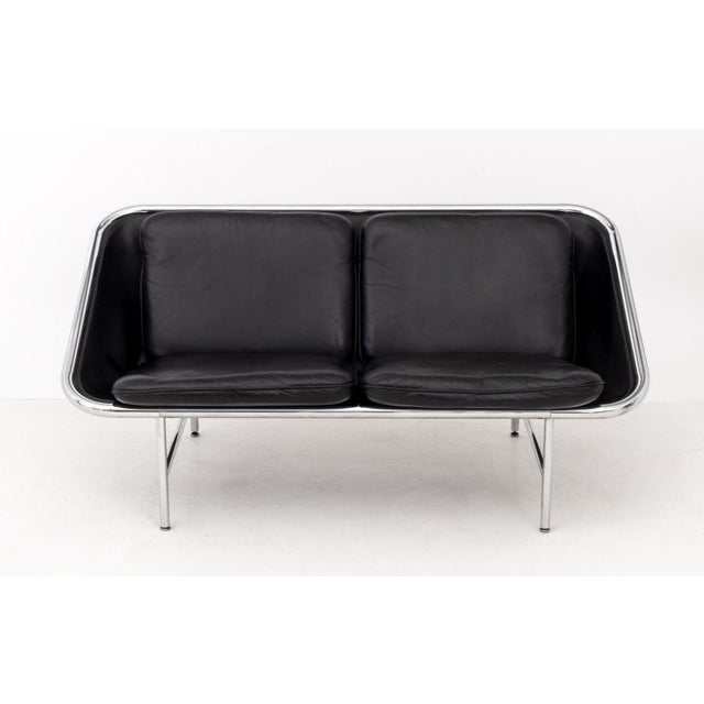 George Nelson (American, 1908-1986) and Associates "Sling" Sofa, Model 6381, with black leather cushions on chrome-plated...
