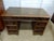 This Vintage Mahogany Pedestal Desk is a beautifully crafted piece of furniture from the mid-20th century. Made from wood...
