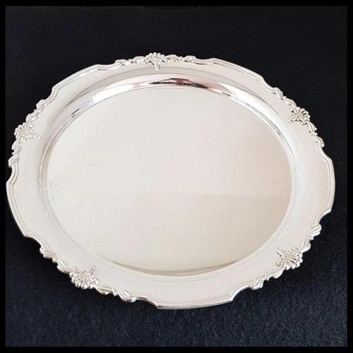 An elegant late 20th-century English sterling silver salver or serving tray by the renowned silversmiths James Dixon &...