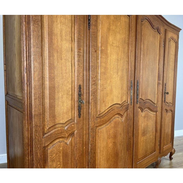 Vintage Louis XVI French Four Door Oak Carved Armoire For Sale - Image 10 of 12