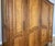 Vintage Louis XVI French Four Door Oak Carved Armoire For Sale - Image 10 of 12