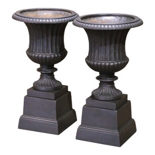 Pair of 19th Century French Neoclassical Cast Iron Urns With Plinth Bases For Sale
