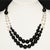 Dramatic two strand vintage beaded necklace with hook closure. It is comprised of matte black glass beads and faceted...