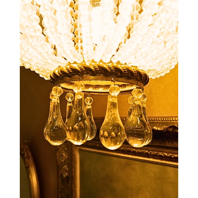 This superb crystal basket chandelier is probably one of the finest currently available in Europe. Crafted from chased...