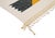 Two offset zigzag-edged blocks in charcoal grey and mustard yellow float against an open ivory field, their sawtooth edges...