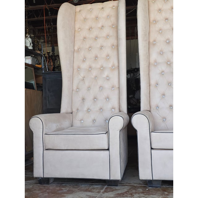 Very Unique extra grand tall wingback chairs perfect for a dramatic impression. Tufted with inset large Rhinestone like...
