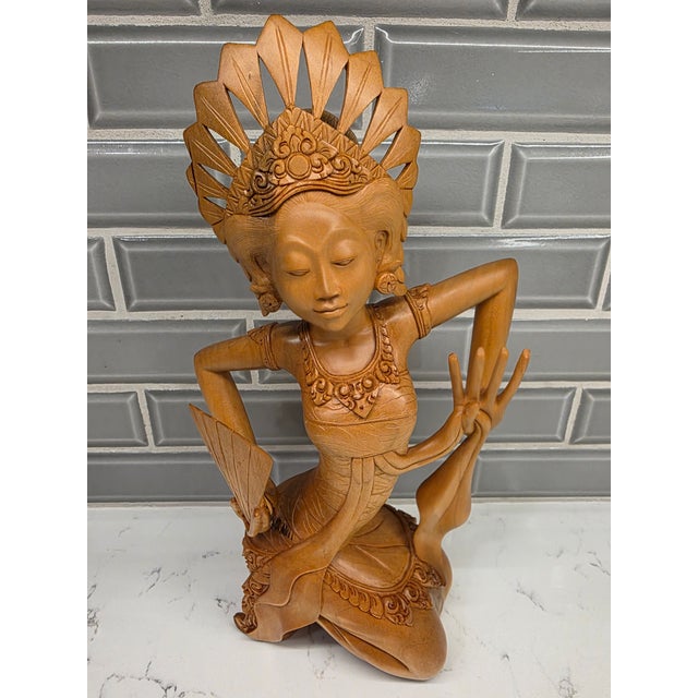 An absolute museum-grade masterpiece of late mid-century Balinese modernism, this striking 12½-inch sculpture depicts a...