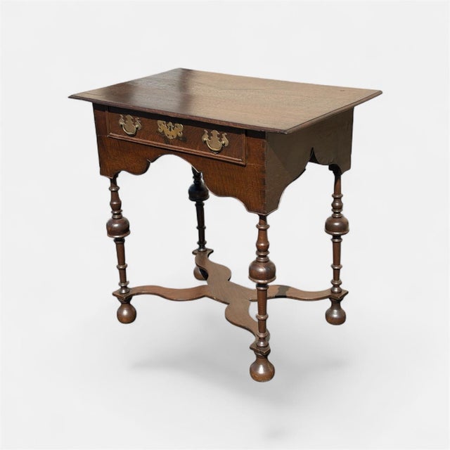 Original 18th century. English origin. An exceptional x stretcher oak side table. Made of quarter sawn oak. Overhanging...