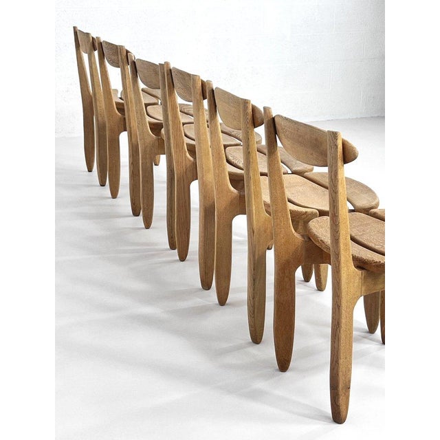 Set of 6 French oak dining chairs by Guillerme et Chambron from the 1960s, 'Thierry' model. I have official proof of...