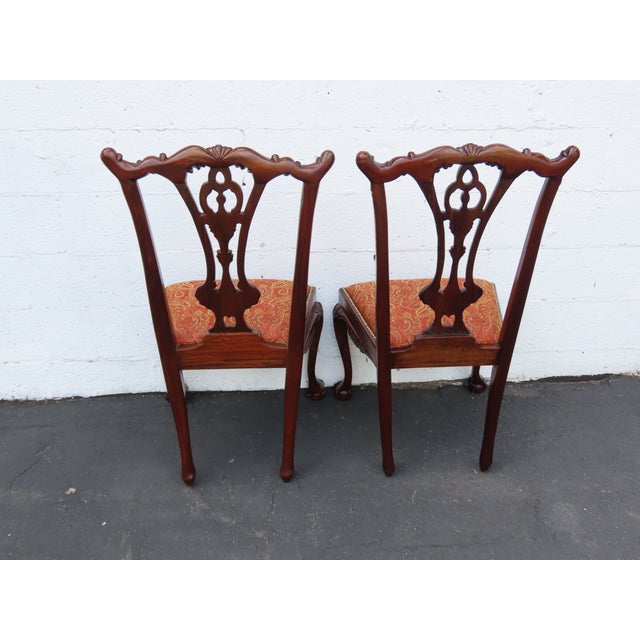 This gorgeous Pair of Dining Chairs is made of wood, solid wood, solid mahogany, and upholstery. This magnificent dining...