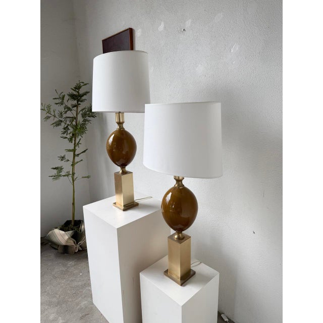 Pair of ceramic and brass table lamps, by philippe barbier in the 70s. we love their xl formats, the beauty of the overall...