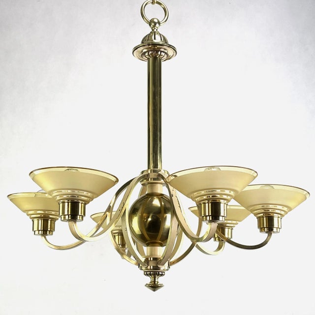 This rare, original hanging lamp impresses with its geometric shape. The lamp gives a very pleasant light. This ceiling...